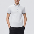 White cotton men's polo shirt with chest pocket